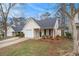 View of home with one-car garage and well-maintained lawn at 132 Prity Ct, Mcdonough, GA 30253