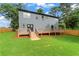 Back of house features large wooden deck with a fenced in yard at 1400 Bouldercrest Rd, Atlanta, GA 30316