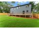 Back of house features large wooden deck with a fenced in yard at 1400 Bouldercrest Rd, Atlanta, GA 30316