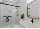 Contemporary bathroom featuring a glass-enclosed shower, sleek vanity, and stylish fixtures at 1400 Bouldercrest Rd, Atlanta, GA 30316
