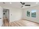 Bedroom with wood-look floors, ceiling fan, and lots of natural light creating a cozy space at 1400 Bouldercrest Rd, Atlanta, GA 30316