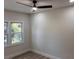 Light-filled bedroom with a ceiling fan, neutral tones, offering a calming and versatile space at 1400 Bouldercrest Rd, Atlanta, GA 30316