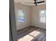 Bedroom with two windows and wood floors at 1400 Bouldercrest Rd, Atlanta, GA 30316