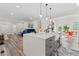 Open concept kitchen with an island, sink and view of the living room and dining area at 1400 Bouldercrest Rd, Atlanta, GA 30316