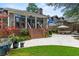 Beautiful backyard featuring a patio, landscaped garden, and lounge area at 1518 Cambridge Ave, Atlanta, GA 30337