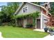 Charming backyard studio with climbing plants, a quaint door, and well-manicured landscaping at 1518 Cambridge Ave, Atlanta, GA 30337