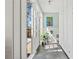 Bright hallway with natural light, slate flooring, ample storage, and a view to the deck at 1518 Cambridge Ave, Atlanta, GA 30337