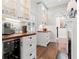 Charming kitchen features white cabinets, wood counters, and a wine fridge for modern living at 1518 Cambridge Ave, Atlanta, GA 30337