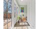 Mud room with storage cabinets, tiled floors, and access to the outdoor deck at 1518 Cambridge Ave, Atlanta, GA 30337