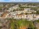 Wide aerial perspective of the neighborhood displaying many homes and ample tree coverage at 2304 Stancrest Ln, Lawrenceville, GA 30044