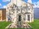 The home features a spacious backyard with a patio and well-maintained lawn, perfect for outdoor entertaining at 2304 Stancrest Ln, Lawrenceville, GA 30044