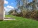 The home has a large backyard with ample green space, offering plenty of room for recreation and relaxation at 2304 Stancrest Ln, Lawrenceville, GA 30044