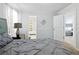Bedroom featuring a bed that looks toward an open en-suite bathroom at 2304 Stancrest Ln, Lawrenceville, GA 30044