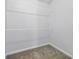 Spacious walk-in closet with ample hanging space, offering optimal storage solutions at 2304 Stancrest Ln, Lawrenceville, GA 30044