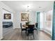Stylish dining room with modern lighting and hardwood floors at 2304 Stancrest Ln, Lawrenceville, GA 30044