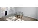Loft hallway featuring a decorative glass table with views of the staircase below at 2304 Stancrest Ln, Lawrenceville, GA 30044