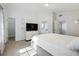 Bedroom features neutral tones, walk-in closet, and ensuite bathroom at 2304 Stancrest Ln, Lawrenceville, GA 30044