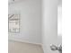 Bright bedroom features natural light through a window and neutral carpeting at 4362 White Spruce Aly, Doraville, GA 30360