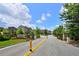 The Heights at Carver Hills gated entrance shows beautiful landscaping at 4362 White Spruce Aly, Doraville, GA 30360