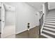 Bright entryway with hardwood floors and staircase to the upper level at 4362 White Spruce Aly, Doraville, GA 30360