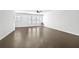 Spacious living room with hardwood floors and abundant natural light at 4362 White Spruce Aly, Doraville, GA 30360