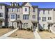 Charming brick townhouse with landscaped front and inviting entrance at 4362 White Spruce Aly, Doraville, GA 30360