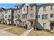 Charming brick townhouse with landscaped front and inviting entrance at 4362 White Spruce Aly, Doraville, GA 30360