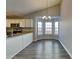 Kitchen with stainless steel appliances and a view of the dining area at 930 Rafington Dr, Lawrenceville, GA 30046