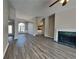Spacious living room showcases fireplace and wood floors at 930 Rafington Dr, Lawrenceville, GA 30046