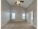 Large bedroom with ceiling fan and windows for plenty of natural light at 930 Rafington Dr, Lawrenceville, GA 30046