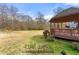 Spacious backyard with a gazebo, offering an ideal space for outdoor activities and relaxation at 1710 Meadowchase Ct, Snellville, GA 30078