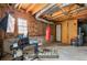 Unfinished basement space offering potential for customization, with exposed beams and a functional layout at 1710 Meadowchase Ct, Snellville, GA 30078