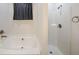 Bright bathroom features a soaking tub and walk-in shower at 92 Fairview Oak Trce, Dallas, GA 30157