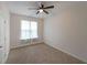 Bedroom featuring carpet, a ceiling fan and a double-paned window at 92 Fairview Oak Trce, Dallas, GA 30157