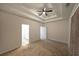 Well-lit bedroom with tray ceilings and en-suite bath at 92 Fairview Oak Trce, Dallas, GA 30157