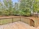 Spacious backyard featuring a wooden deck and a wood fence at 1605 Mcgarity Rd, Mcdonough, GA 30252