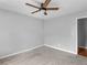 Bedroom featuring neutral walls, carpeted floor, and ceiling fan at 1605 Mcgarity Rd, Mcdonough, GA 30252