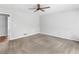 A spacious bedroom with neutral walls, carpet, and a ceiling fan at 1605 Mcgarity Rd, Mcdonough, GA 30252