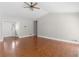 Inviting living room with hardwood floors and a vaulted ceiling at 1605 Mcgarity Rd, Mcdonough, GA 30252