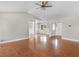 Spacious living room boasts hardwood floors and seamless access to other areas at 1605 Mcgarity Rd, Mcdonough, GA 30252