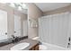 Bathroom features a granite vanity, with a shower and tub combo at 67 Oak Landing Way, Douglasville, GA 30134