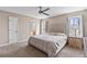 Bedroom featuring a bed, natural light, carpet, and ensuite bathroom at 67 Oak Landing Way, Douglasville, GA 30134