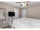 Neutral bedroom featuring a television, and dual closets, creating a modern and inviting space at 67 Oak Landing Way, Douglasville, GA 30134