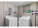 A functional laundry room features modern washing machines and efficient space, making laundry tasks effortless at 67 Oak Landing Way, Douglasville, GA 30134