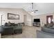 Comfortable living room with a stone fireplace, stylish decor, and neutral color palette at 67 Oak Landing Way, Douglasville, GA 30134