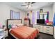 Bedroom with salmon colored comforter and plenty of storage at 69 Polar Rock Sw Rd, Atlanta, GA 30315