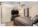 Bedroom with ceiling fan, window, dresser and television at 69 Polar Rock Sw Rd, Atlanta, GA 30315