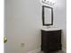 Bathroom with a wooden stand alone sink and vanity at 110 Great Oaks Ln, Roswell, GA 30075