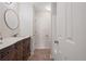 Bathroom with a stand alone vanity and a tiled floor at 110 Great Oaks Ln, Roswell, GA 30075