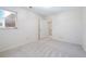 Cozy bedroom featuring neutral carpet and ample natural light at 110 Great Oaks Ln, Roswell, GA 30075